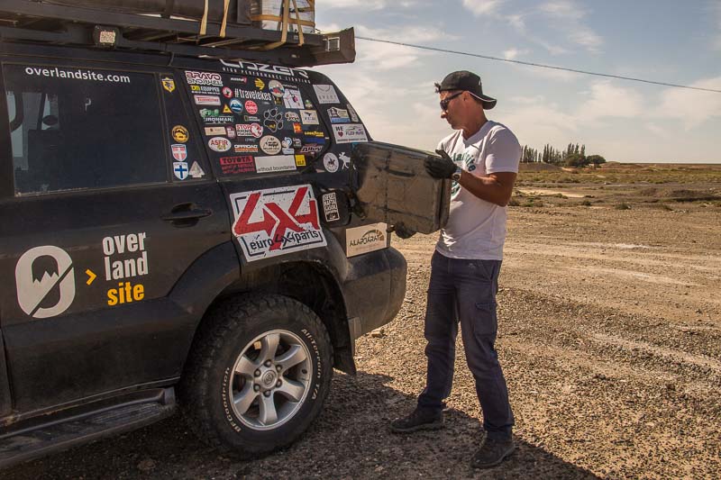 jerry can filling up the tank - overlanding